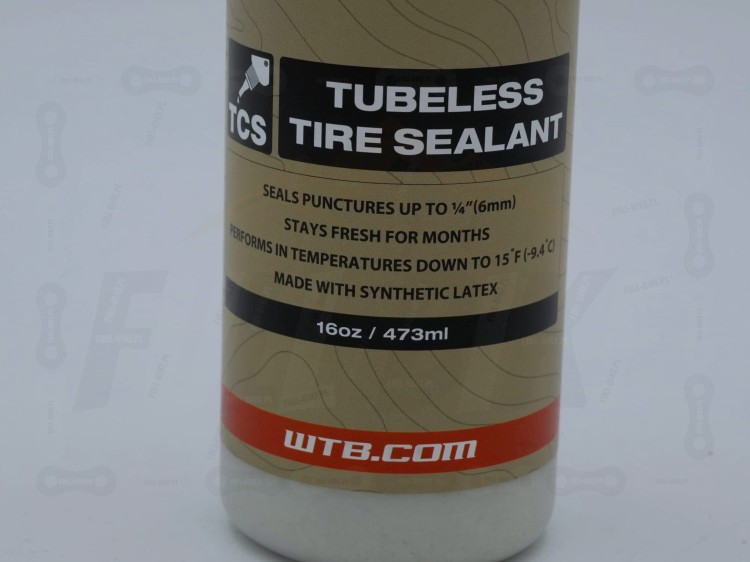 Mleko Tubless WTB TCS 2.0 473ml widok od boku, zbliżenie na etykiete