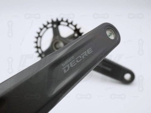 Mechanizm Korbowy Shimano DEORE FC-M5100-1  zbliżenie na napis
