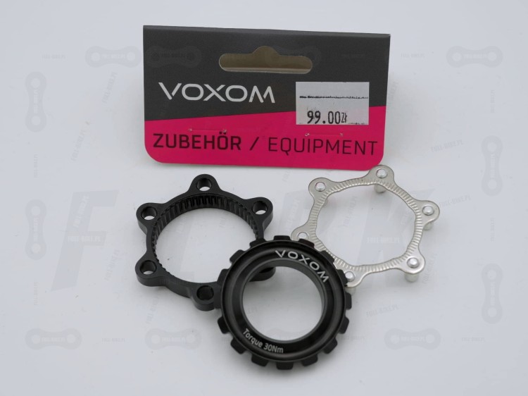 Adapter centerlock / 6 śrub Voxom na tle opakowania
