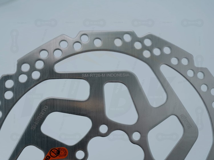 Tarcza hamulcowa Shimano SM-RT26 180mm z mocowaniem pod 6 śrub zbliżenie na grawer