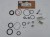 Uszczelki do dampera powietrzengo Rock Shox Deluxe B1, B2 oraz  Deluxe Re:Aktiv A1, B1 na tle etykiety