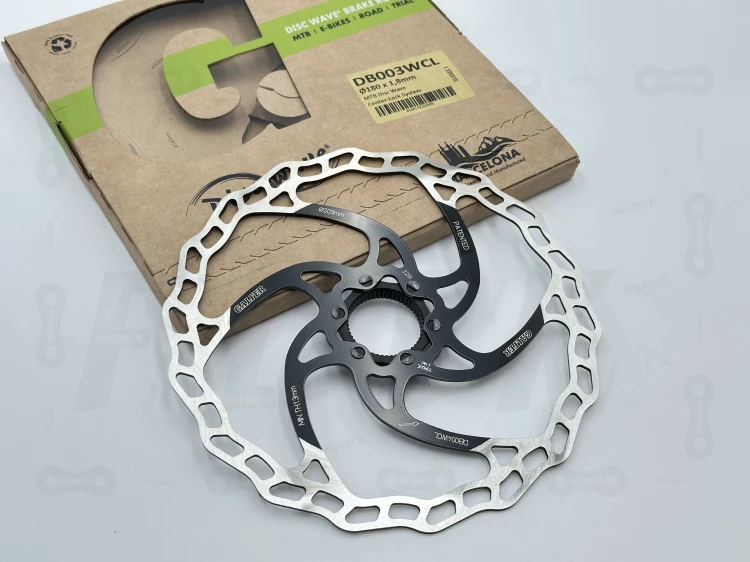 Tarcza hamulcowa Galfer 180mm o grubości 1.8mm z mocowaniem center lock. Na tle oryginalnego opakowania