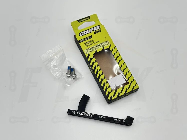Adapter hamulca Galfer SB004W w rozmiarze +23mm. Na tle oryginalnego opakowania