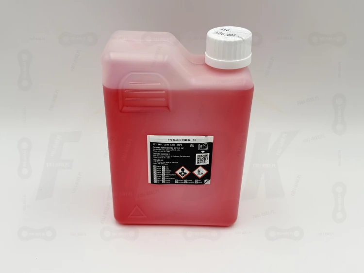Płyn Hamulcowy Mineralny Shimano 1000Ml (na rynek UE) główne zdjęcie produktu z widokiem na front butelki z nazwa producenta i dokładnym modelem produktu oraz na etykietę informacyjną