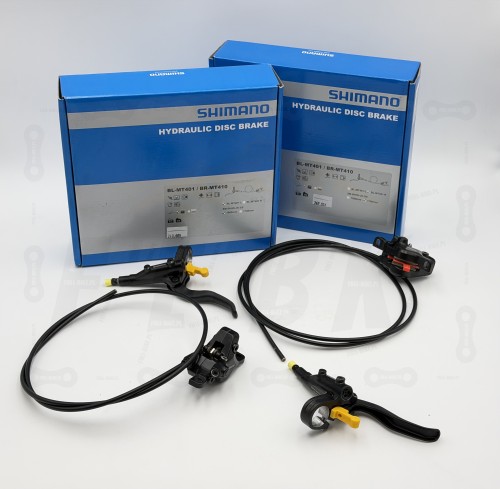 Hamulec tarczowy Shimano Mt-401/410 na zdjęciu są widoczne dwa zestawy, przedni i tylni hamulec wraz z opakowaniami producenta